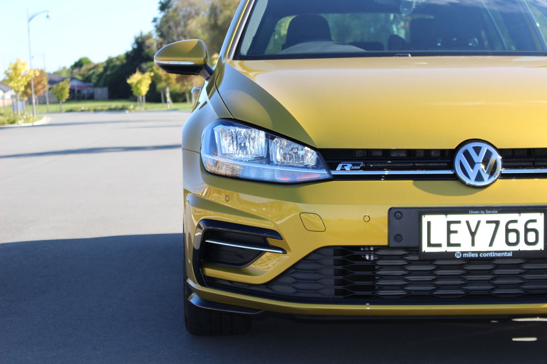 Sporty styling features of the VW Golf R-Line in Turmeric